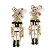 Load image into Gallery viewer, Pink Nutcracker Beaded Earrings, Christmas Earrings, Holiday Earrings, Christmas Beaded Earrings, Seed Bead, Merry Christmas, Pink Nutcracker soldier earrings, pink beaded earrings, Christmas beaded earrings, pink bead earrings, Pink holiday earrings, holiday earrings, Nutcracker earrings, Pink earrings, holiday gifts, holiday accessories, holiday beaded accessories, Holiday Pink accessories, Holiday Christmas earrings, Christmas gifts, Best seller, best Selling items, Christmas earrings, Custom earrings