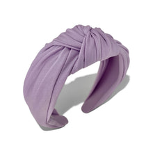 Load image into Gallery viewer, A twisted fabric headband in a soft lavender-purple color, shown on a clean white background with a soft shadow.