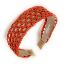 Load image into Gallery viewer, Bright orange raffia-inspired headband featuring an elegant open-weave pattern and structured silhouette.