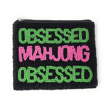 Load image into Gallery viewer, Black beaded pouch with 'Obsessed Mahjong Obsessed' text in green and pink on a white background