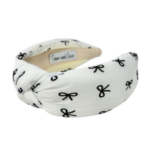 Load image into Gallery viewer, Patterned fabric headband with a playful scissors motif.