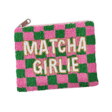 Load image into Gallery viewer, A small zippered pouch covered in pink and green checkered beads, with the words “MATCHA GIRLIE” spelled out in large cream beads outlined in gold. A silver zipper pull is visible at the top left.