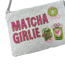 Load image into Gallery viewer, A light green beaded shoulder bag with a silver chain strap, featuring 'MATCHA GIRLIE' in pink beaded letters and illustrations of matcha drinks on a white background.