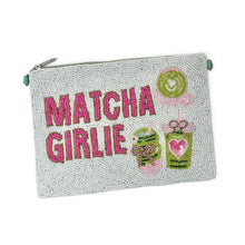 Load image into Gallery viewer, A large zippered pouch with a textured light green beaded surface, featuring the words 'MATCHA GIRLIE' in pink, alongside green and pink matcha-themed illustrations, on a white background.
