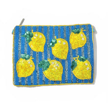 Load image into Gallery viewer, Blue striped beaded pouch decorated with sparkling yellow lemon sequins and playful citrus-inspired detailing on a white background.