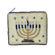 Load image into Gallery viewer, Hand beaded Hanukkah pouch with blue and gold menorah design on ivory background.