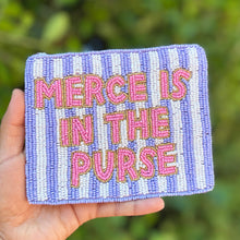 Load image into Gallery viewer, Twine and Love lavender and white striped hand-beaded pouch featuring pink "Merce Is in the Purse" lettering with gold detailing.