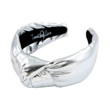 Load image into Gallery viewer, Shiny silver padded headband with twisted knot detail