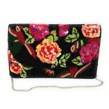 Load image into Gallery viewer, Black statement clutch featuring vibrant sequin flowers in shades of pink, coral, red, and green with handcrafted beadwork.