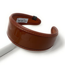 Load image into Gallery viewer, Elegant wide headband in warm brown patent material