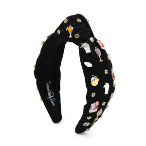 Black headband adorned with small, colorful different drink charms and rhinestones, creating a playful and chic vibe. Features the "TwinLad Love" logo inside.
