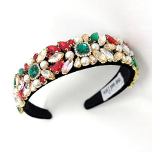 Load image into Gallery viewer, A jeweled headband with colorful gems in red, green, and pink, adorned with pearls on a black base, exudes an elegant and luxurious feel.