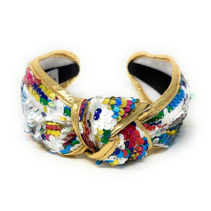 Gold padded headband adorned with colorful sequins, displaying a vibrant, playful design. 