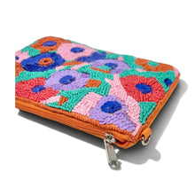 Load image into Gallery viewer, Bright botanical beaded clutch showcasing a playful garden-inspired pattern in coral, turquoise, pink, and royal blue.