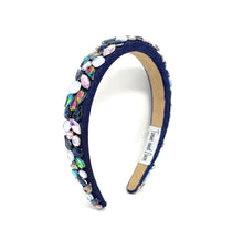 Load image into Gallery viewer, Navy blue headband adorned with colorful, iridescent gemstones, arranged intricately. 