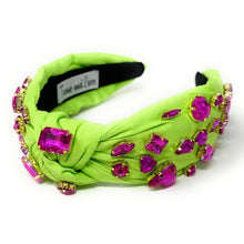 Load image into Gallery viewer, Neon green knotted headband embellished with bold pink gemstones and sparkling rhinestone details.