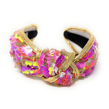Load image into Gallery viewer, orange, pink and yellow neon sequins headband with a knot design, adorned with multicolored sequins. The vibrant accessory has a playful and chic aesthetic.