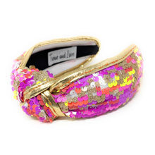 Load image into Gallery viewer, orange, pink and yellow neon sequins headband with a knot design, adorned with multicolored sequins. The vibrant accessory has a playful and chic aesthetic.