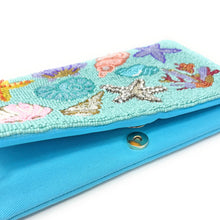 Load image into Gallery viewer, Colorful beaded clutch featuring shells, starfish, and coral on a turquoise background. The vibrant design conveys a lively, ocean-themed vibe.