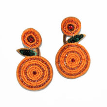 Load image into Gallery viewer, Orange beaded earrings with circular design on a white background