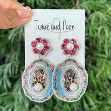 Load image into Gallery viewer, Colorful embroidered earrings on a 'Twine and Love' card with a green leafy background