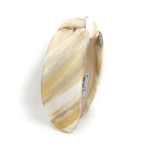 Load image into Gallery viewer, Trendy headband made of patterned fabric in light yellow and cream shades.