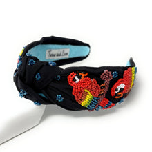 Load image into Gallery viewer, A black fabric headband with a twisted knot, decorated with colorful beaded lobster motifs and blue bead accents, displayed on a white surface.