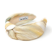Load image into Gallery viewer, Trendy headband made of patterned fabric in light yellow and cream shades.
