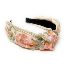 Load image into Gallery viewer, Embroidered headband with pink and orange floral patterns and green leaves on a cream background. Textured, elegant, and stylish accessory.