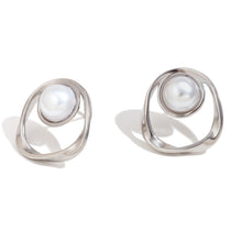 Load image into Gallery viewer, Pair of silver earrings with pearl-like stones on a white background