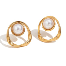 Load image into Gallery viewer, 18k Gold earrings with pearl centers on a white background