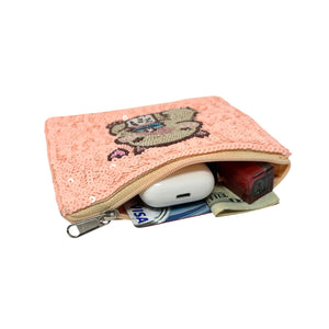 Sequined pouch with a beaded design of a capybara sipping bubble tea, featuring a small pink heart. Playful and whimsical vibe.