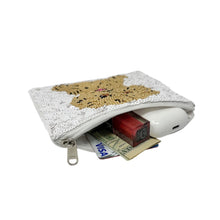 Load image into Gallery viewer, Small pouch with textured surface containing money and a card on a white background