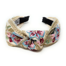 Load image into Gallery viewer, Embroidered headband with floral patterns in pink, blue, and green on a cream background. The intricate designs give an elegant, vintage feel.