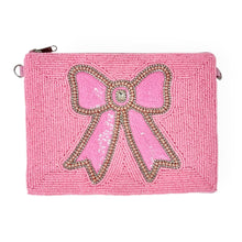 Load image into Gallery viewer, Handcrafted pink beaded coin purse featuring a statement bow with sparkling details.