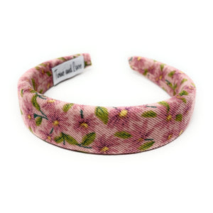 Floral patterned headband on a white background
