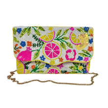 Load image into Gallery viewer, Tropical-inspired beaded envelope clutch featuring bright citrus fruits, green leaves, and multicolor floral embroidery.