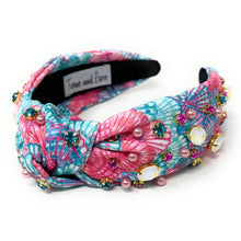 Load image into Gallery viewer, Colorful fabric headband with a twisted knot design, floral patterns, and multicolor jewel detailing
