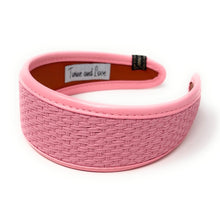 Load image into Gallery viewer, Wide pink woven headband featuring a textured basket-weave design with smooth faux leather trim for a chic and modern look.