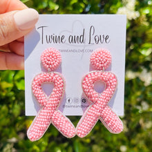 Load image into Gallery viewer, Pink beaded awareness ribbon earrings featuring handcrafted seed bead detailing and matching round stud tops.
