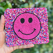 Load image into Gallery viewer, Colorful beaded coin pouch with pink smiley face design held in hand