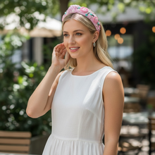Load image into Gallery viewer, Woman in a white dress with a floral headband outdoors