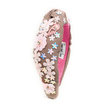 Load image into Gallery viewer, light Brown headband with pink interior, adorned with colorful floral applique and beading. The vibe is playful and feminine, showcasing detailed craftsmanship.