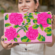 Load image into Gallery viewer, Person holding a pink floral embroidered clutch