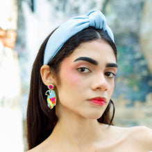 Load image into Gallery viewer, Wide pastel blue headband with a stylish front knot and lightweight woven fabric finish.