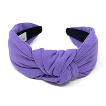 Load image into Gallery viewer, Pastel purple padded headband showcasing a trendy knotted silhouette, perfect for casual and dressy looks.