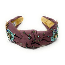 Load image into Gallery viewer, Ornate maroon headband with intricate blue and green beadwork, gold floral accents, and a soft yellow interior, evoking elegance and craftsmanship.