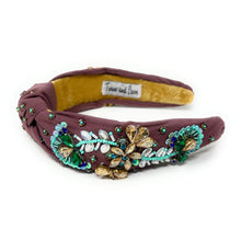 Load image into Gallery viewer, Ornate maroon headband with intricate blue and green beadwork, gold floral accents, and a soft yellow interior, evoking elegance and craftsmanship.