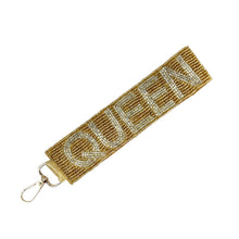 Load image into Gallery viewer, Gold and white 'QUEEN' keychain on a white background