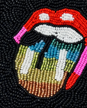 Load image into Gallery viewer, Close-up of intricate beadwork and vibrant rainbow colors on a hand beaded tongue design pouch.